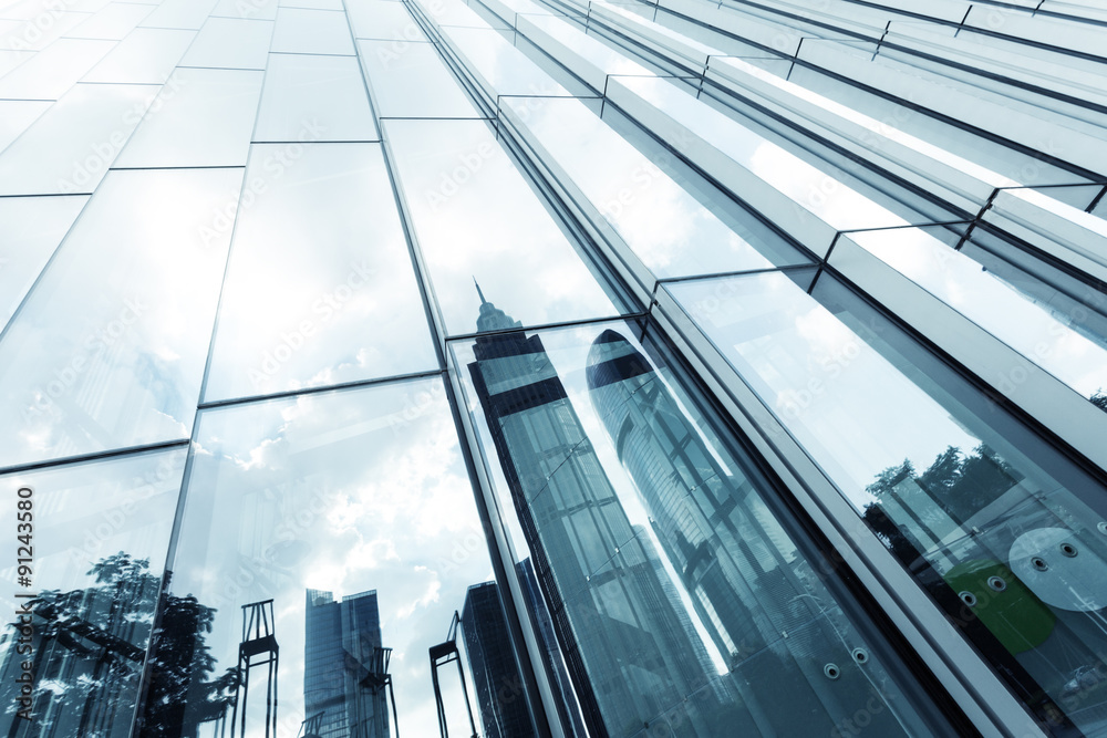 landmarks reflection on glass walls of skyscrapers