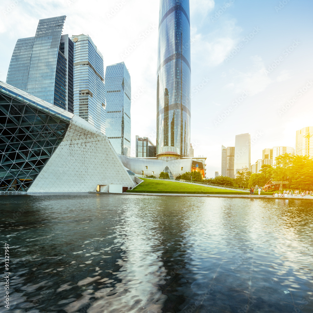 skyscrapers and museum along the waterside