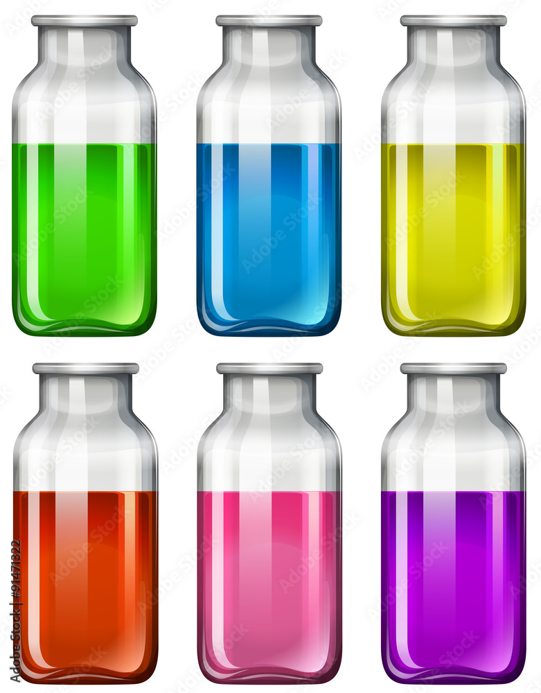 Set of glass bottles with colorful liquid