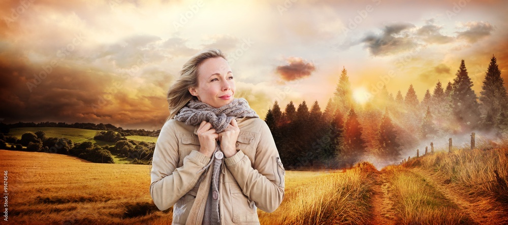 Composite image of pretty blonde in warm clothes