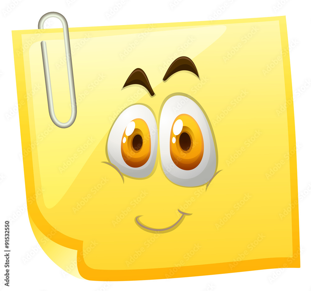 Yellow sticky note with happy face.