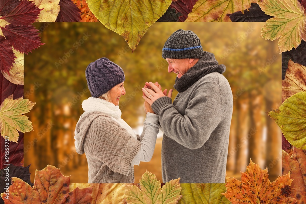 Composite image of happy mature couple in winter clothes