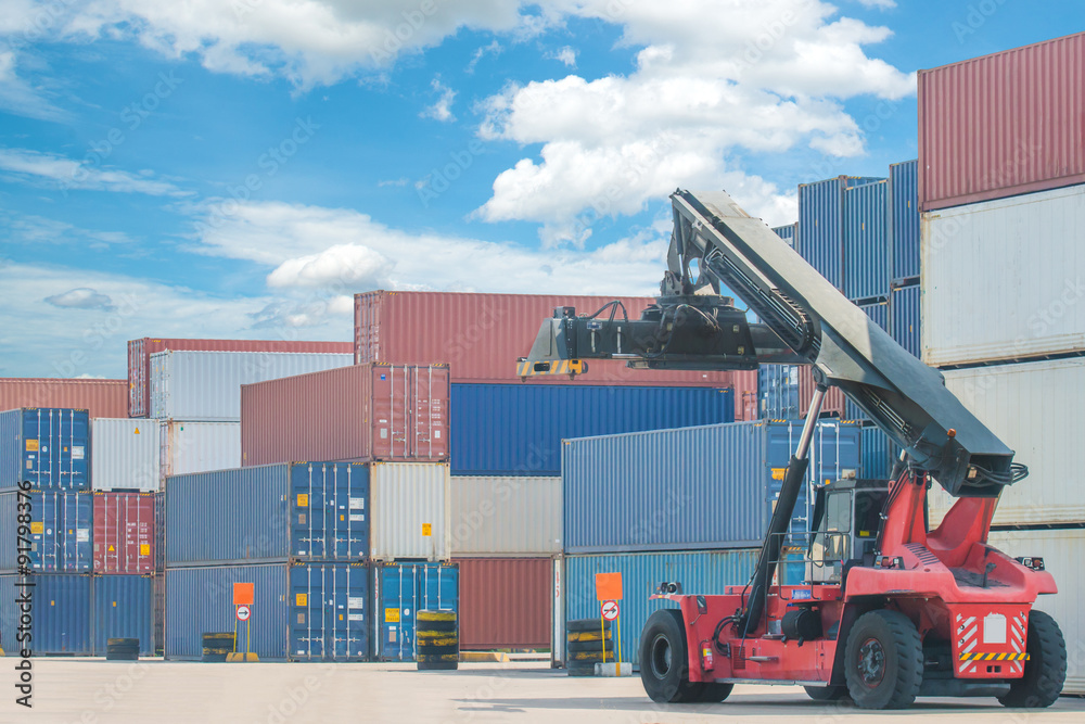 forklift handling container box loading to truck in import expor