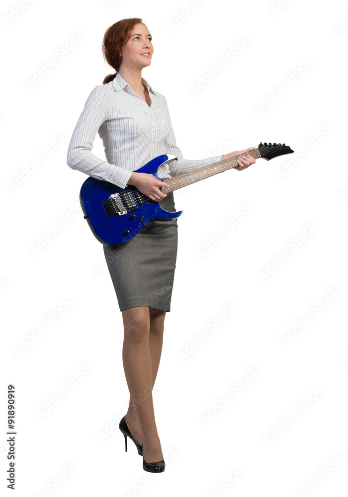 Businesswoman with guitar