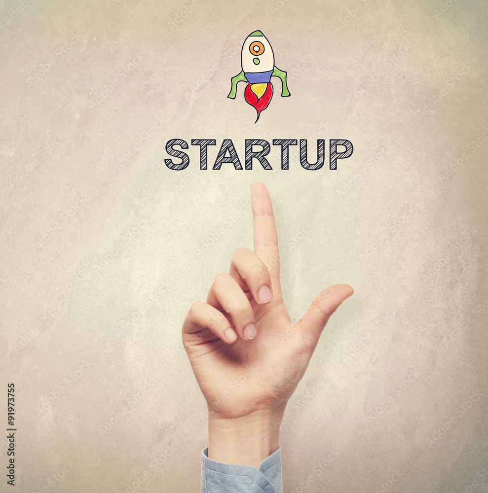 Hand pointing to Startup concept