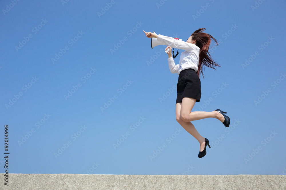 business woman shouting megaphone