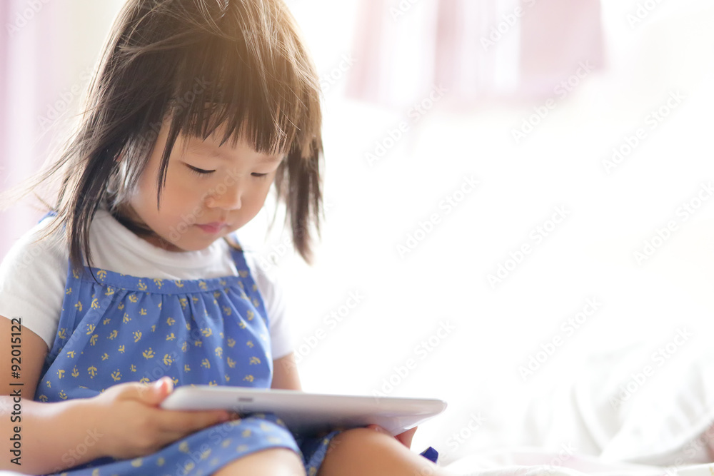 happy girl with tablet PC