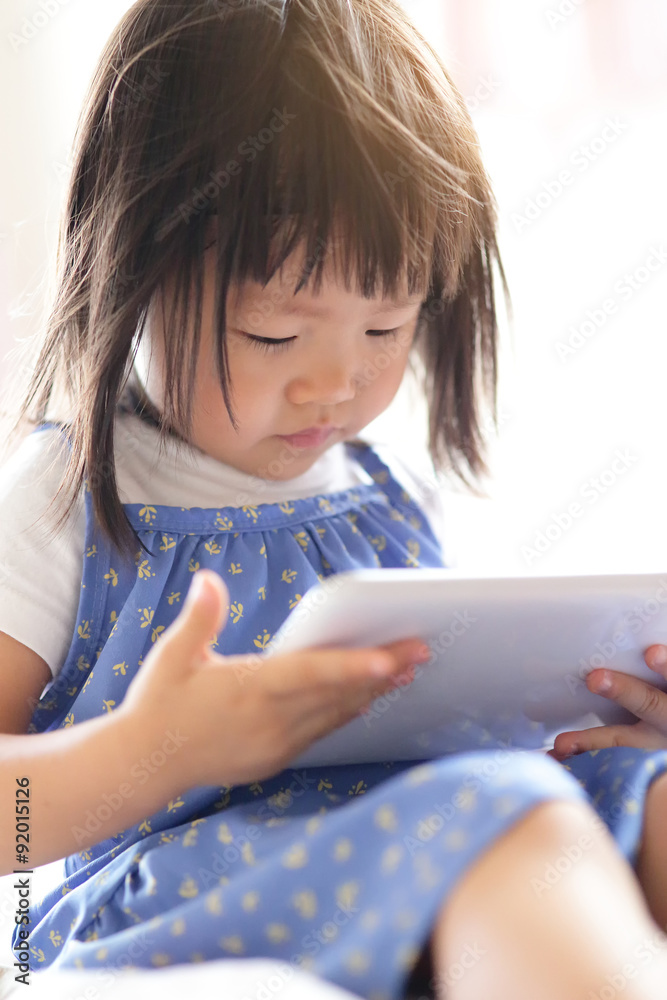 happy girl with tablet PC