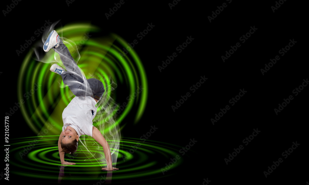 Breakdancer standing on hand