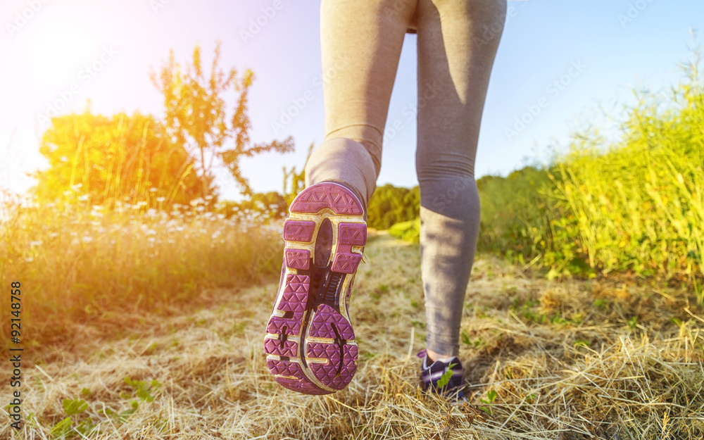 Woman running in a field