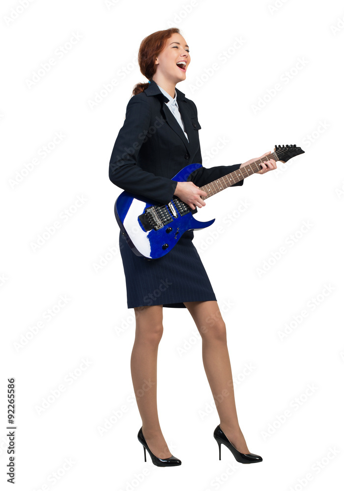 Businesswoman with guitar