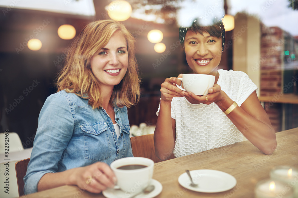 Attractive young multi ethnic female friends