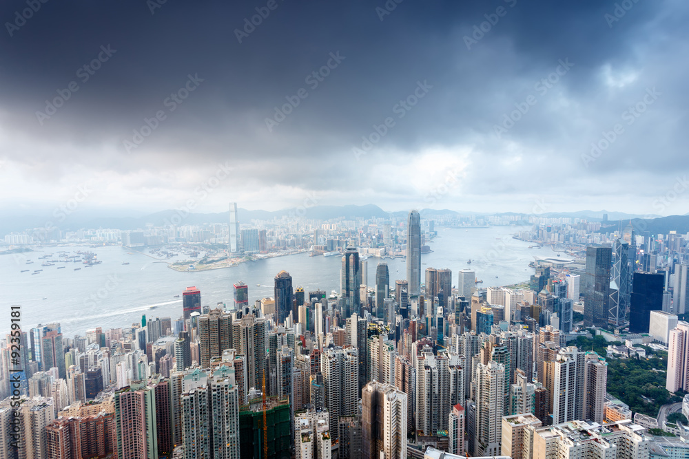 city skyscrapers besides a wide river