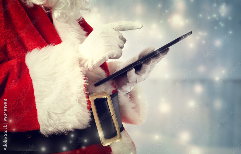 Santa Claus with tablet