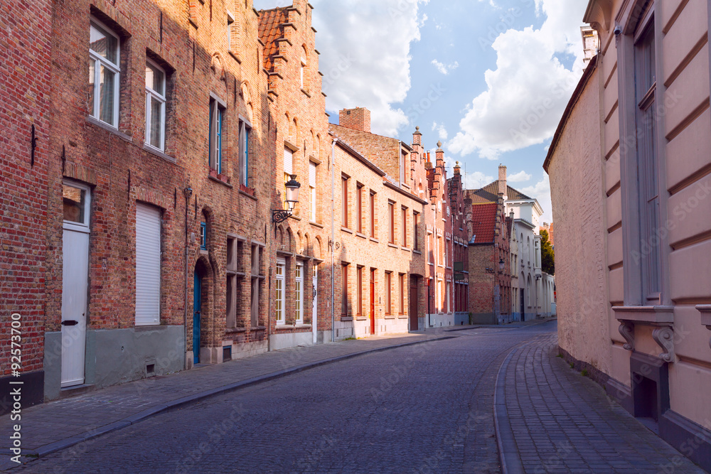 Cobblestone paved street during summer, Bruges