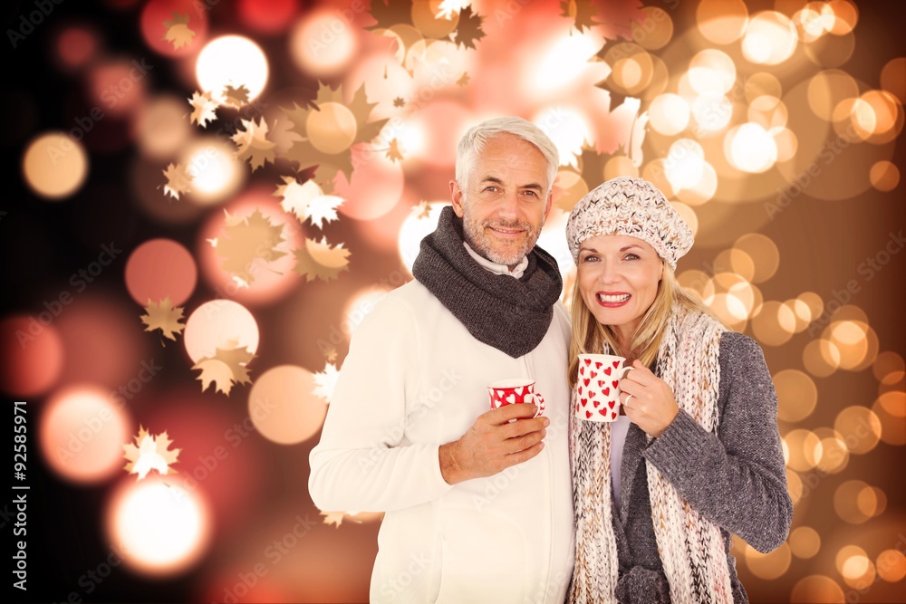 Composite image of portrait of happy couple drinking hot coffee