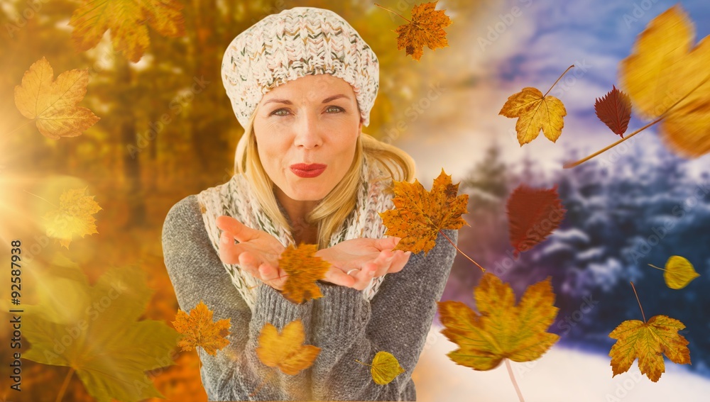 Composite image of happy winter blonde