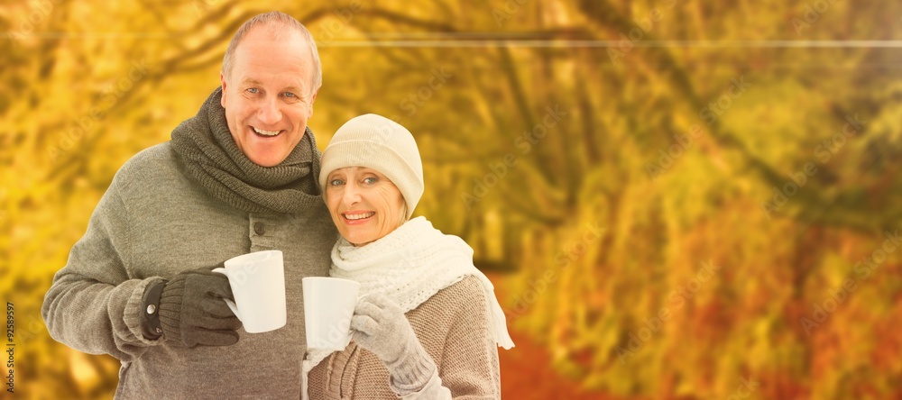 Composite image of happy mature couple in winter clothes