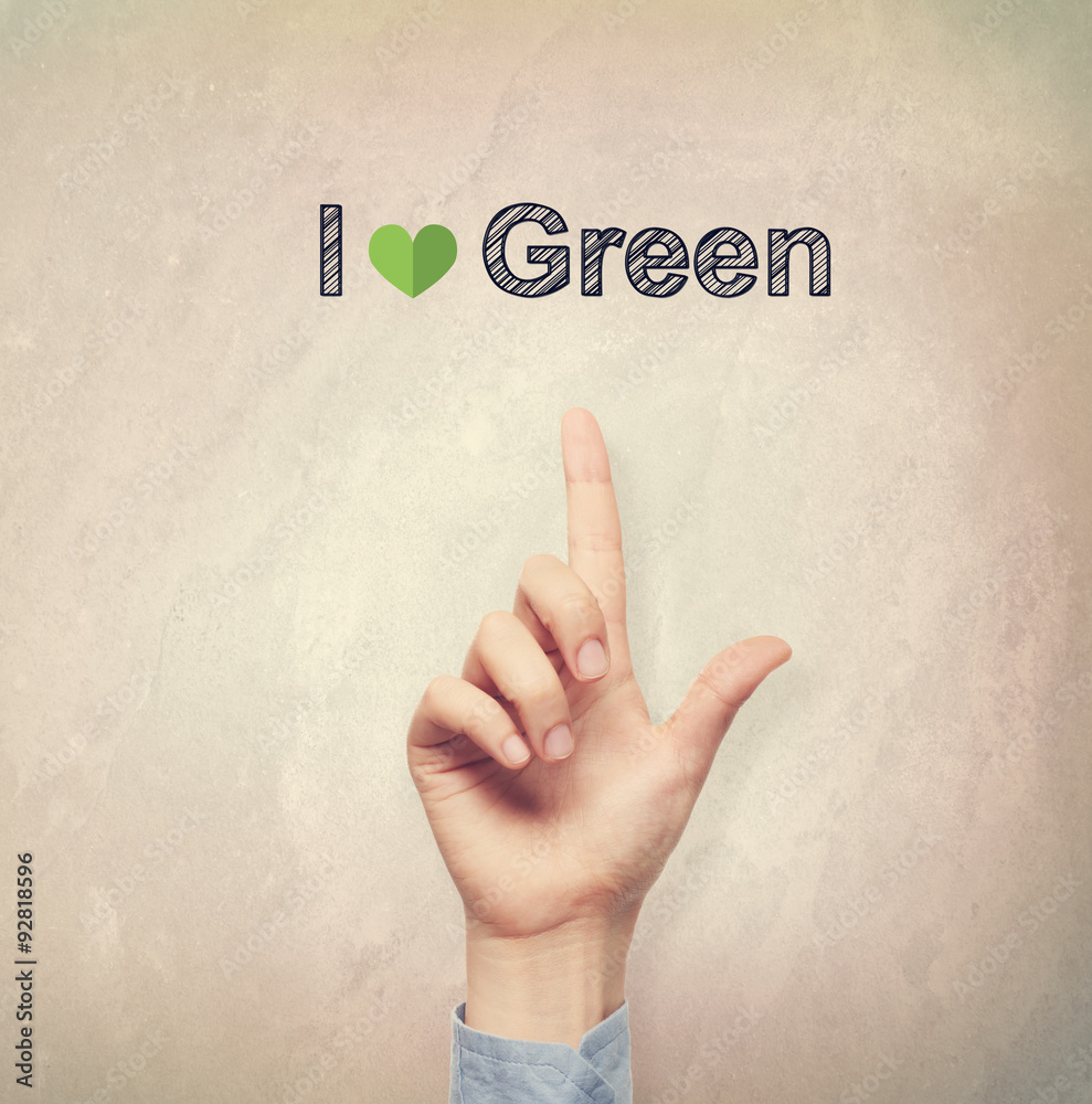 Hand pointing to I Love Green concept