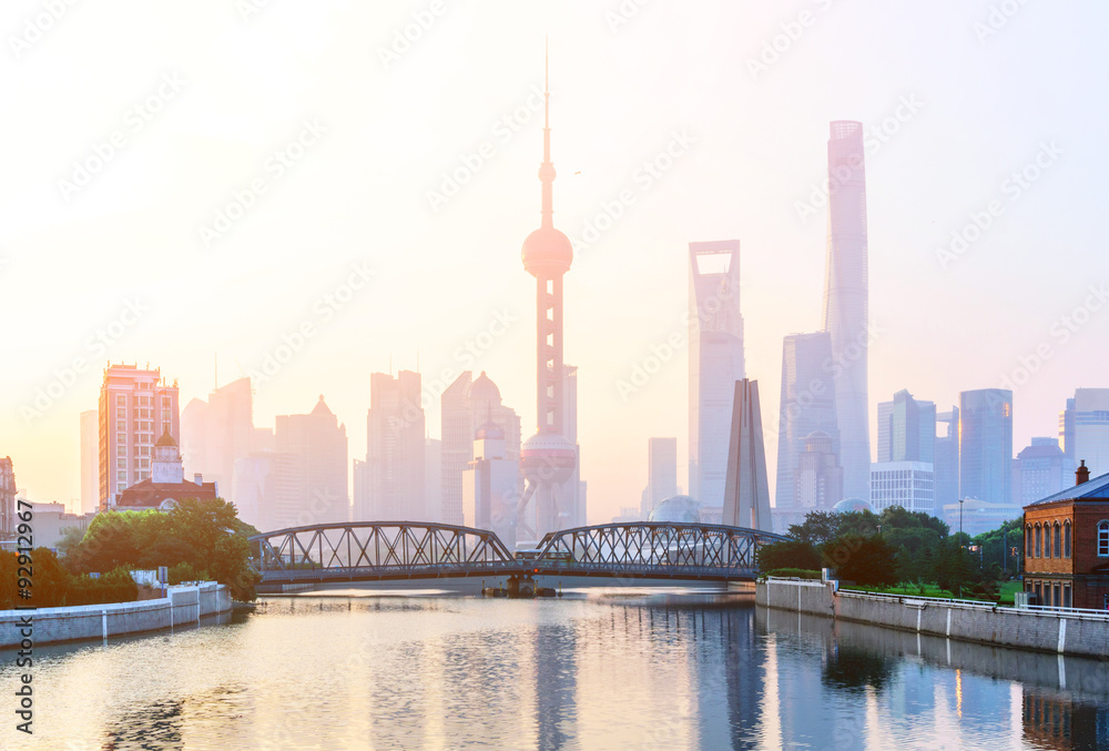 landmarks and a bridge of shanghai on the shore