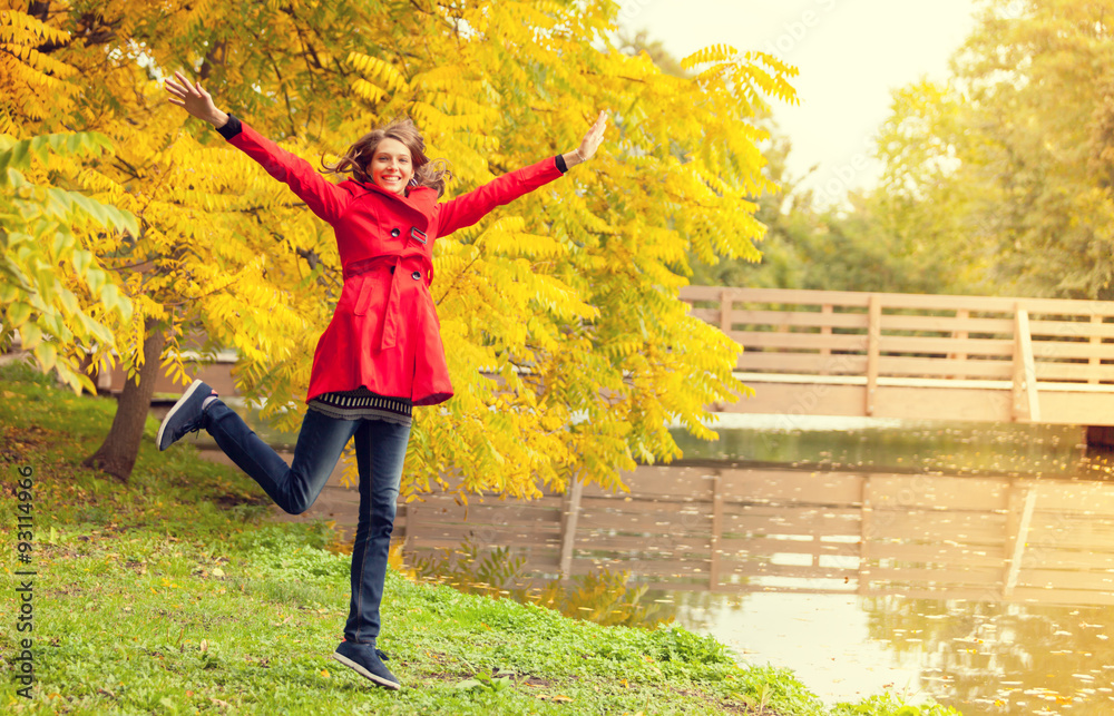 Young woman in autumn forest