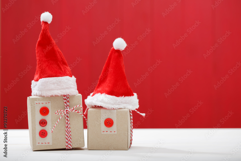 Christmas little gift boxes with Santa hats