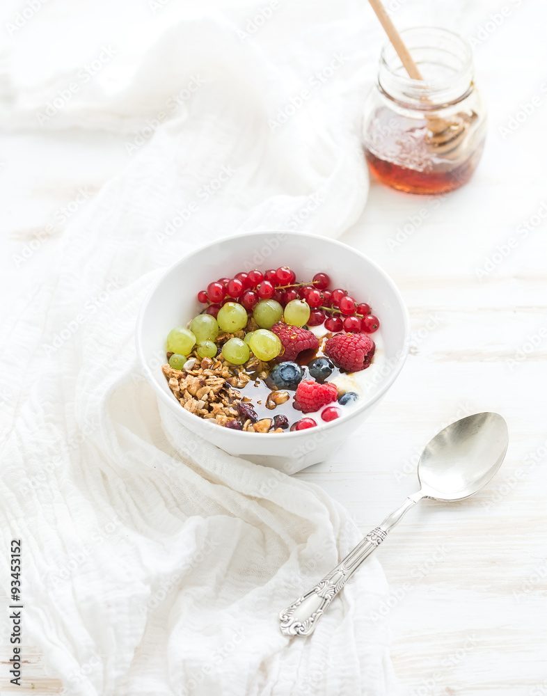 Healthy breakfast. Bowl of oat granola with yogurt, fresh