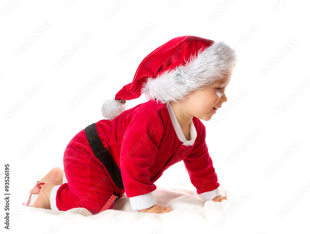 Baby isolated on white background in santa costume