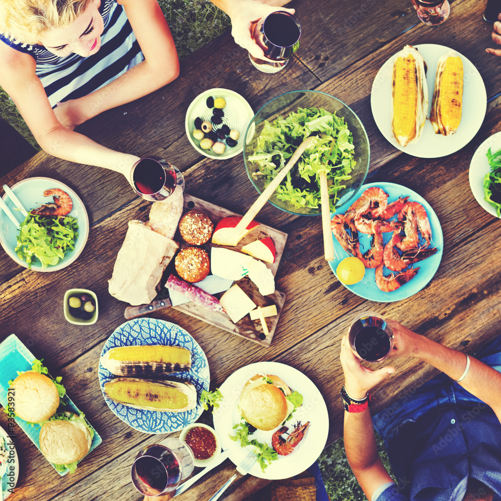 Casual People Eating Together Outdoors Concept