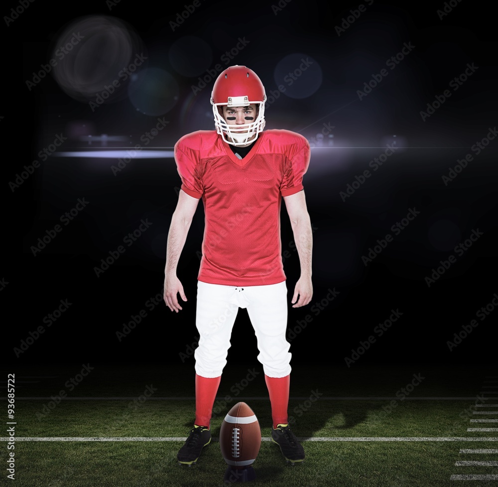 Composite image of serious american football player 