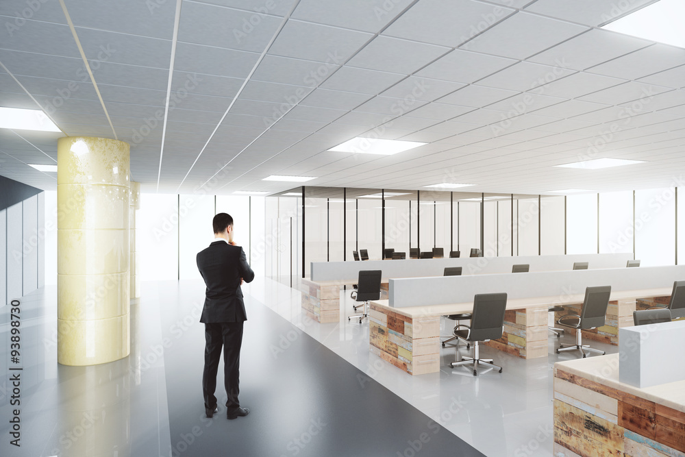 Businessman in open space modern office