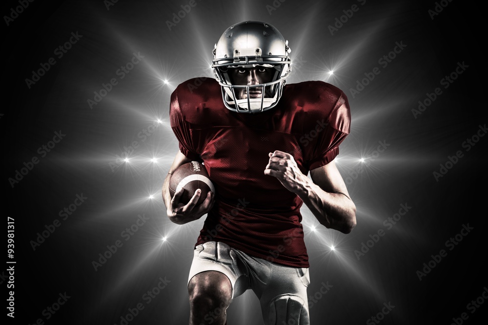 Composite image of american football player in red jersey 