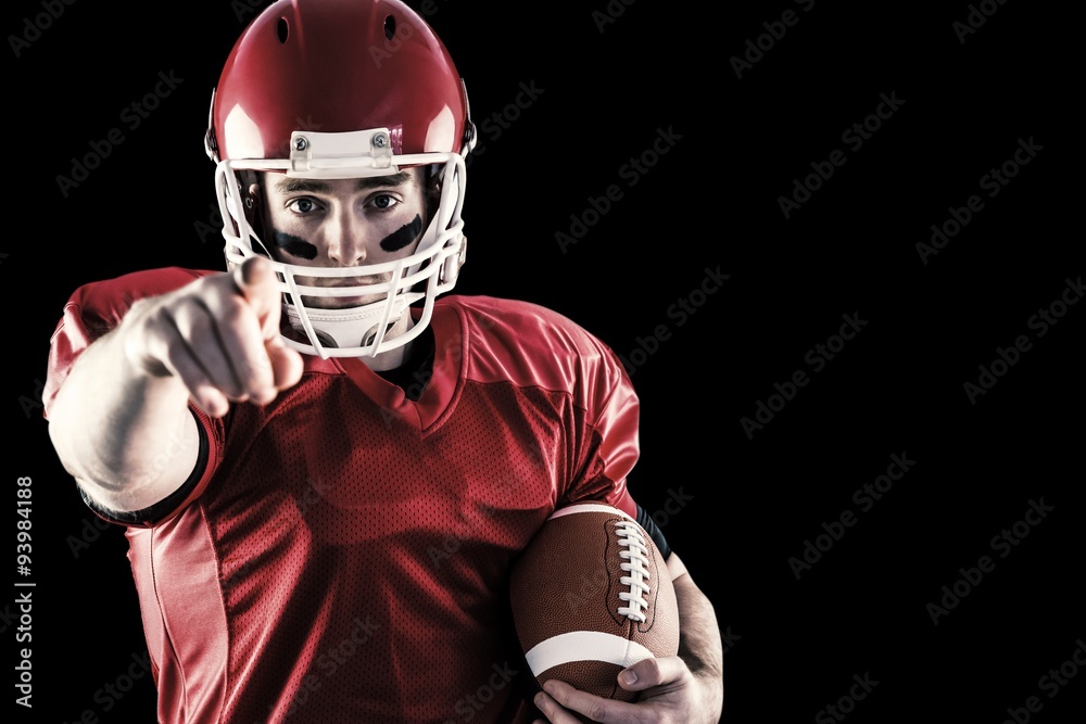 American football player pointing the camera