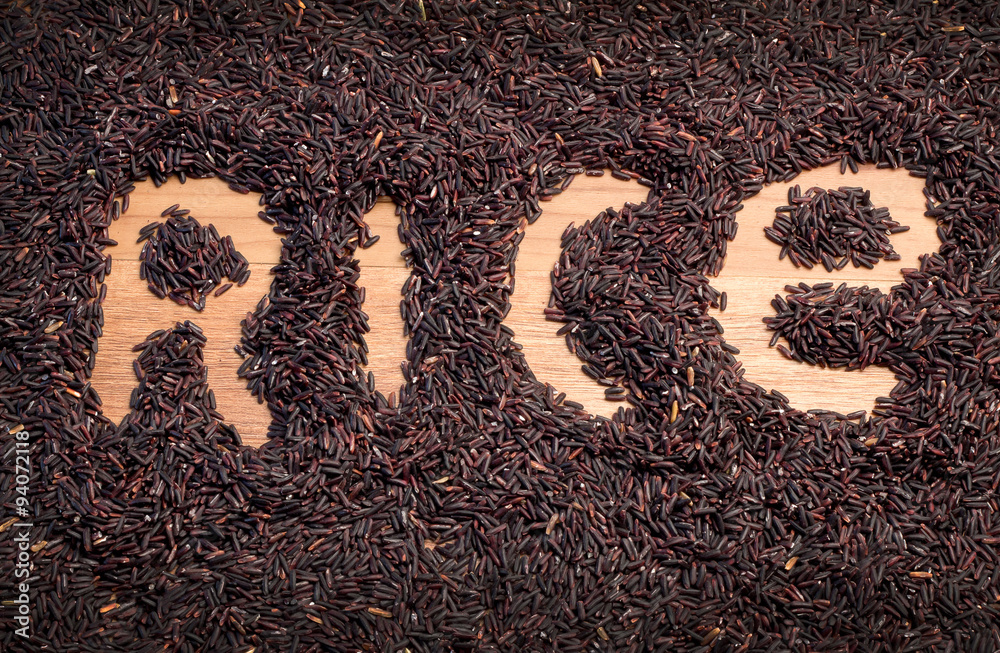 raw riceberry rice on wooden table.jpg