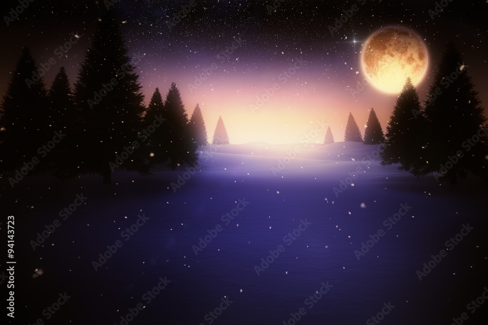 Full moon over snowy landscape