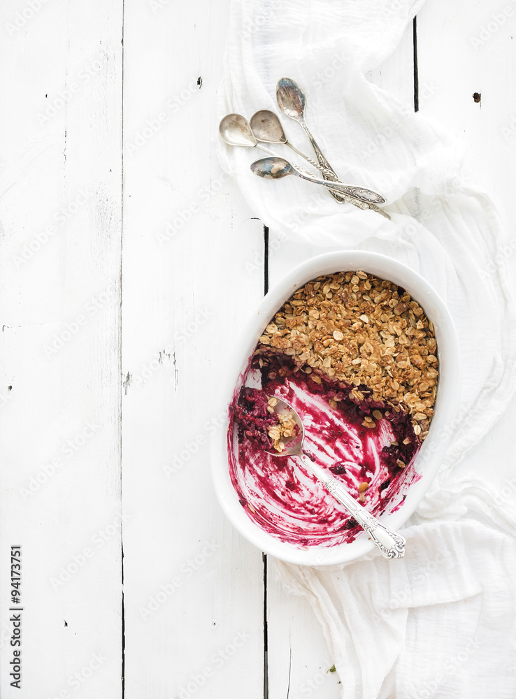 Healthy breakfast. Oat granola berry crumble with  in ceramic