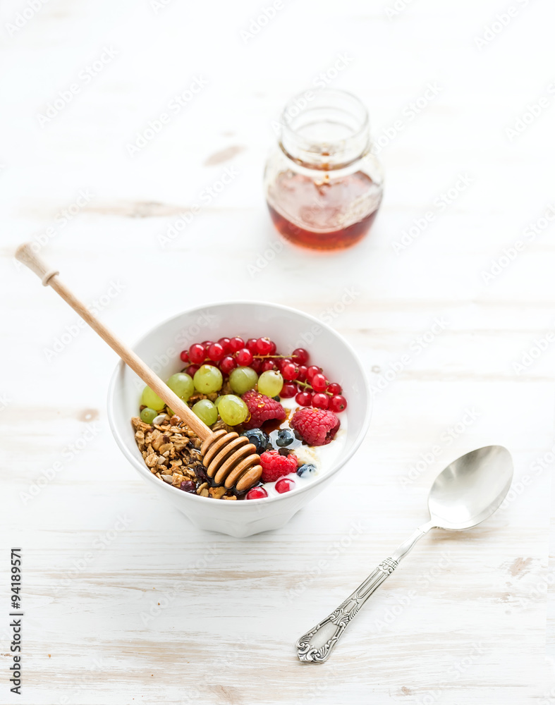 Healthy breakfast. Bowl of oat granola with yogurt, fresh