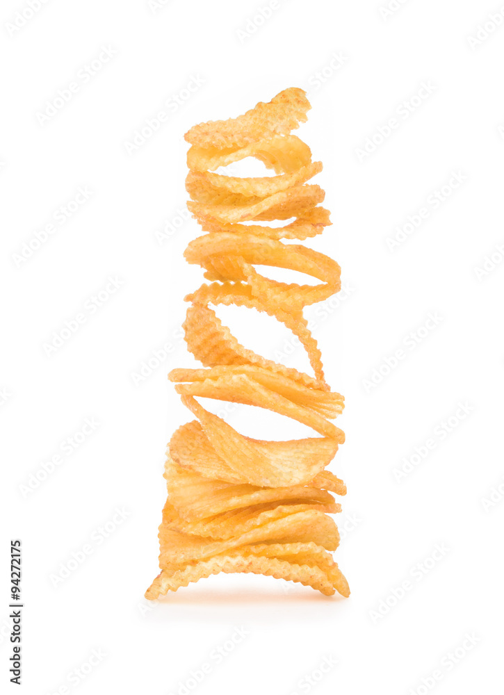 Stack of irregular shape crunchy potato chips on white backgroun