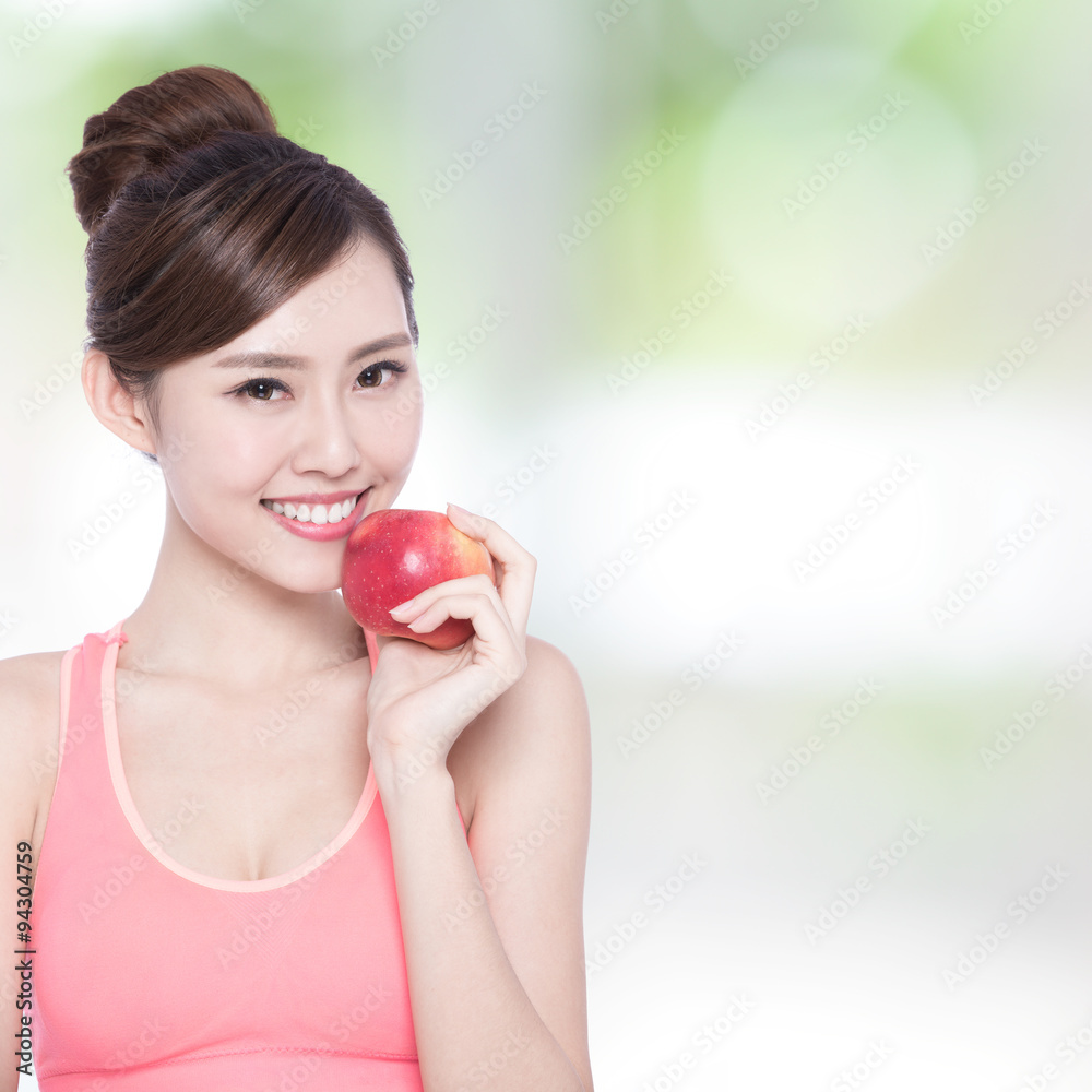 Happy health woman show apple