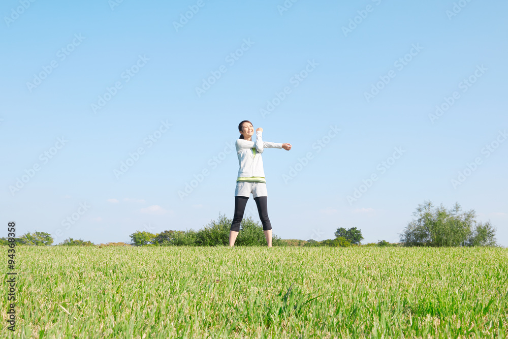 準備運動する女性