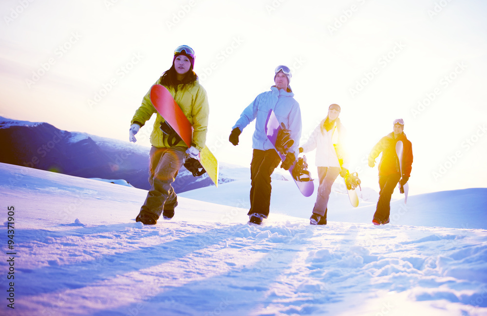 Group of Snowboarders on Top of the Mountain Concept