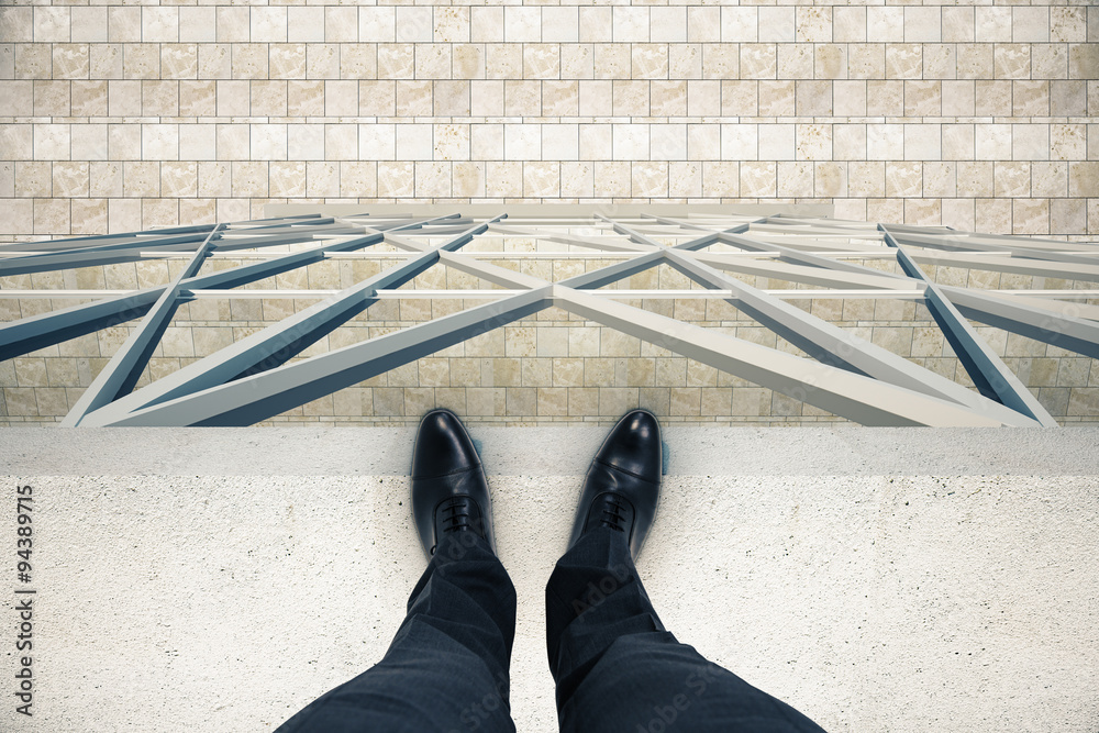 Man standing on the edge of the roof