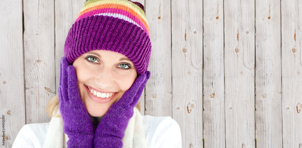 Composite image of young woman with cap and gloves