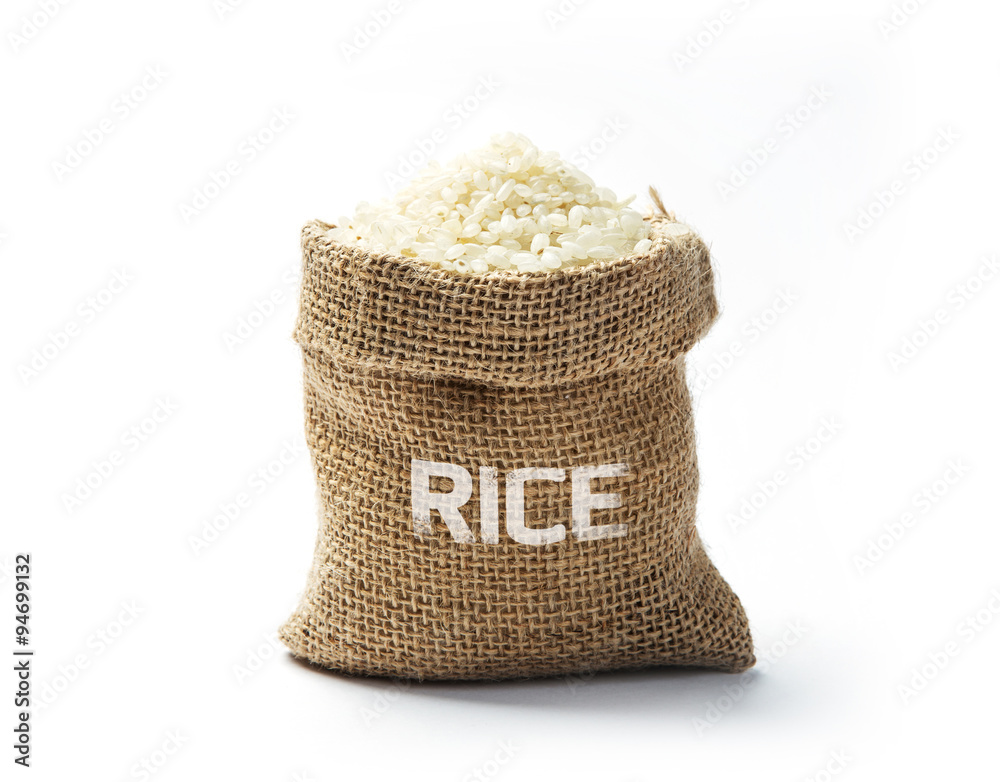 Dry rice grains in burlap