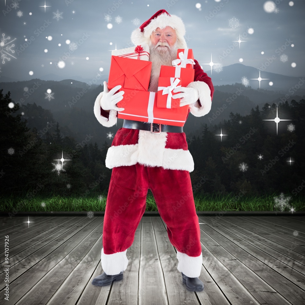 Composite image of santa carrying gifts