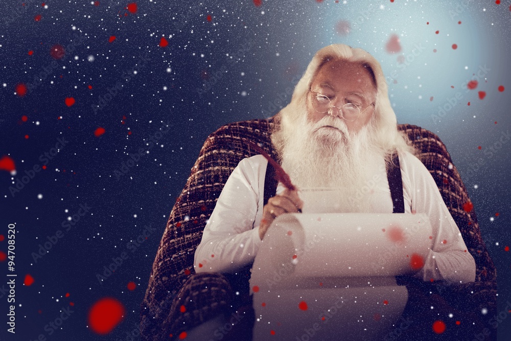 Composite image of father christmas writing list with a quill