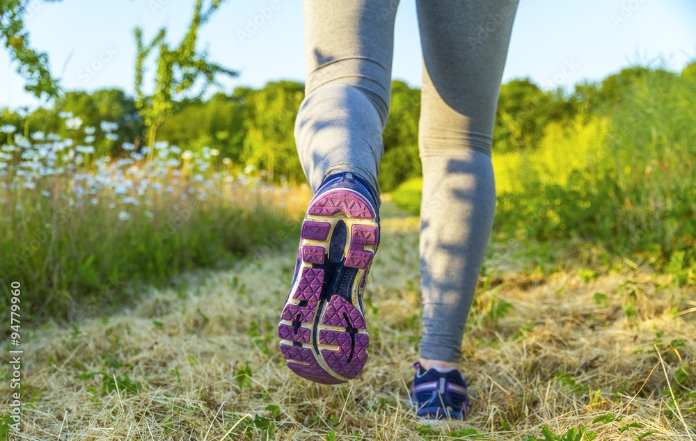 Woman running in a field