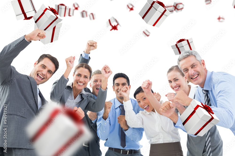 Composite image of business people cheering in office