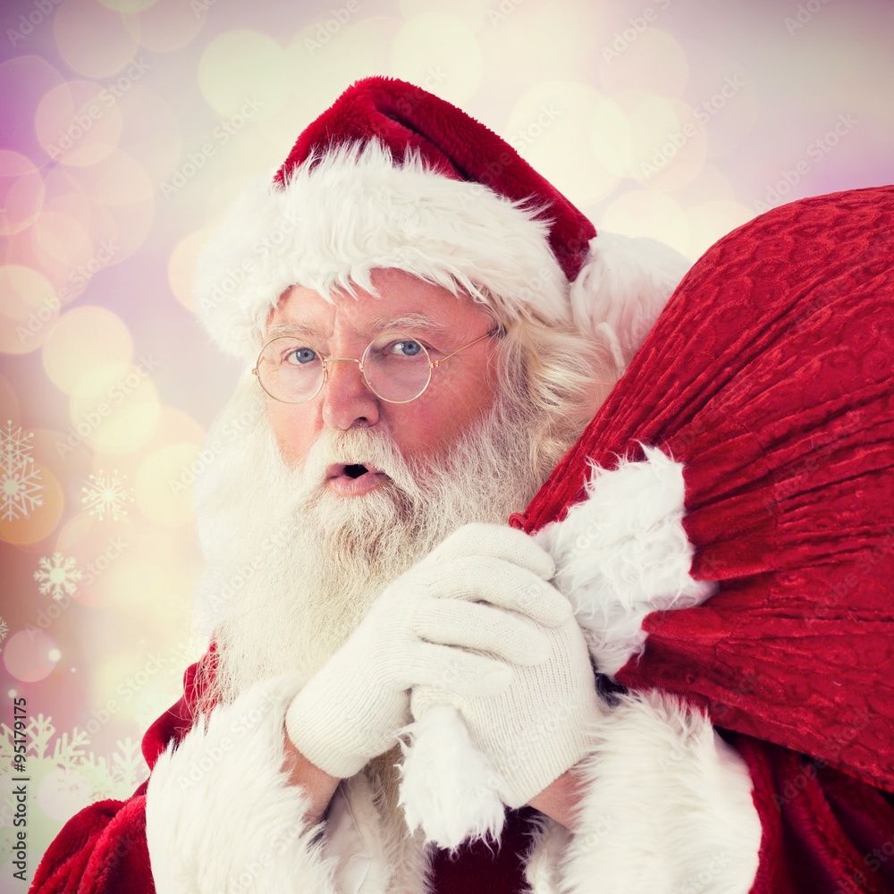 Composite image of santa takes care about his sack