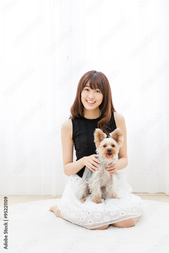 young asian woman with dog